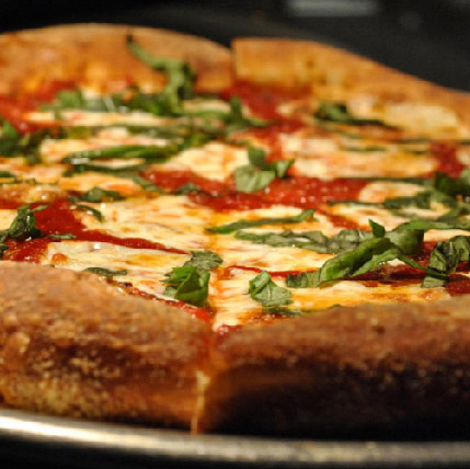 A pepper-laden pizza.